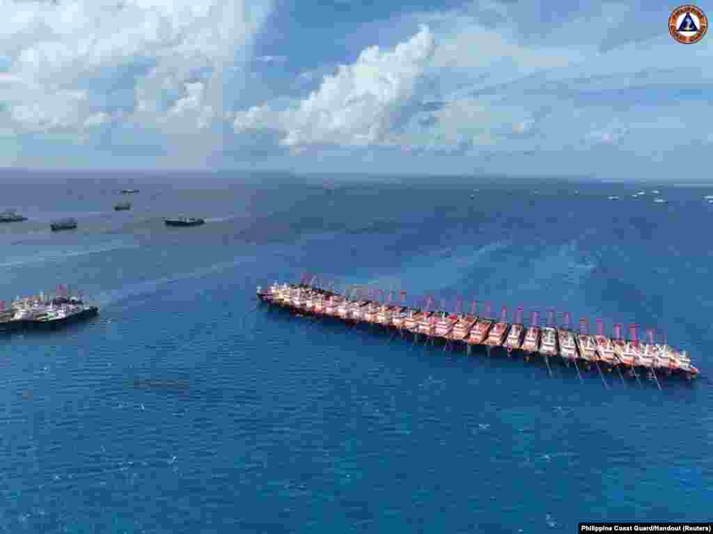 Chinese militia vessels operate at Whitsun Reef in the South China Sea, Dec. 2, 2023.