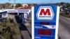 A Marathon gas station is pictured in Bradenton, Florida, Feb. 7, 2024. ConocoPhillips is buying Marathon Oil in an all-stock deal valued at approximately $17.1 billion. 