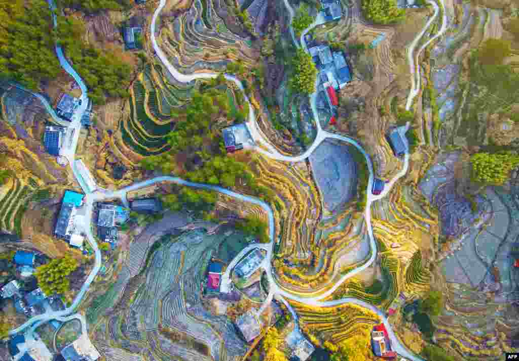 The aerial view shows terraced hills at Helin village in Anqing, in eastern China's Anhui province.