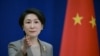 FILE - Juru bicara Kementerian Luar Negeri China Mao Ning dalam konferensi pers di Kementerian Luar Negeri China di Beijing, 15 Januari 2024. (Pedro Pardo / AFP)