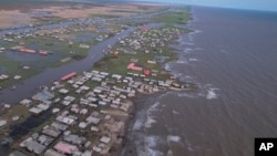 A view of the coastal erosion in Ayetoro, Southwest Nigeria, Friday, April 5, 2024. Ayetoro, a coastal community more than 200 km southeast of Nigeria's business capital Lagos, has been experiencing coastal erosion for many years. (AP Photo/Dan Ikpoyi)
