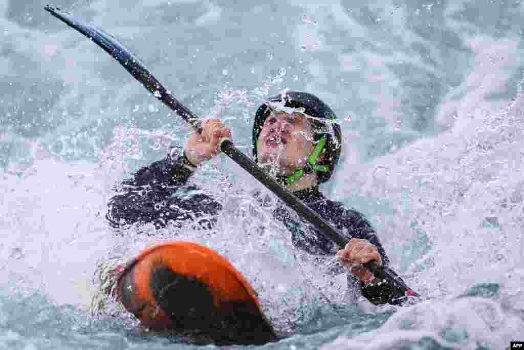 British Oscar Wyllie competes in the men&#39;s kayak cross junior time trial race during the Slalom &amp; Kayak Cross Selection Series, at Lee Valley White Water Centre, in Waltham Cross, north of London.
