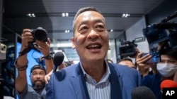 Pheu Thai's prime ministerial candidate Srettha Thavisin who is the sole candidate nominated for a parliamentary vote, speaks to media at the party headquarters in Bangkok, Thailand Tuesday, Aug. 22, 2023. (AP Photo/Wason Wanichakorn)
