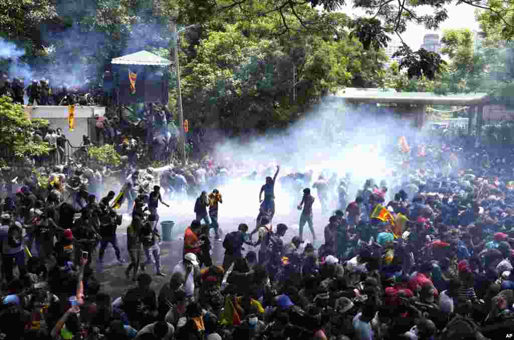 Police use tear gas to disperse the protesters who stormed the compound of Prime Minister Ranil Wickremesinghe's office, demanding his resignation after President Gotabaya Rajapaksa fled the country amid economic crisis in Colombo, Sri Lanka.