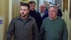 FILE - In this image provided by the Ukrainian Presidential Press Office, Ukrainian President Volodymyr Zelenskyy, left, and U.N. Secretary-General Antonio Guterres walk in a hallway during their meeting in Kyiv, Ukraine, April 28, 2022.