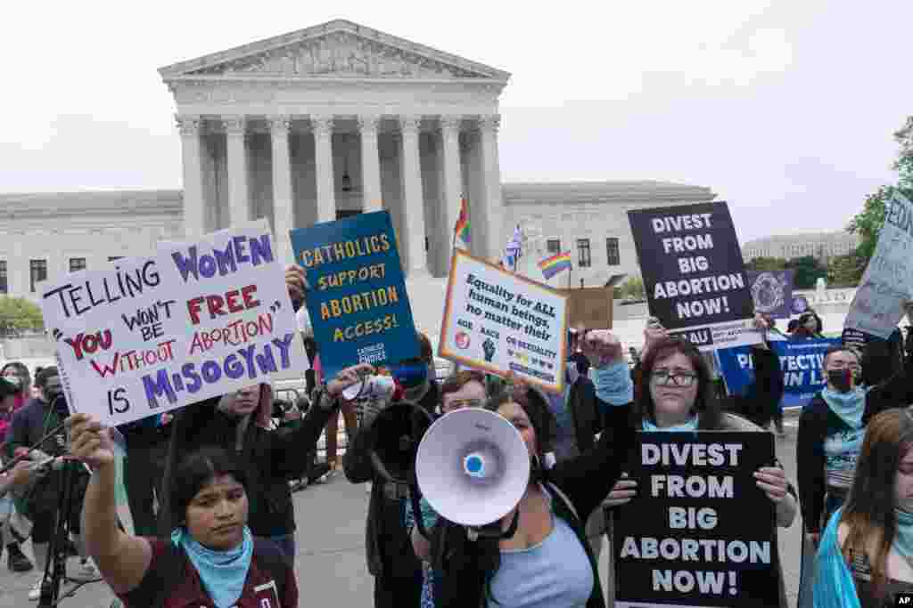 Demonstrators protest outside of the U.S. Supreme Court in Washington. A draft opinion suggests the Supreme Court could be poised to overturn the landmark 1973 Roe v. Wade case that legalized abortion nationwide, according to a Politico report released Monday.