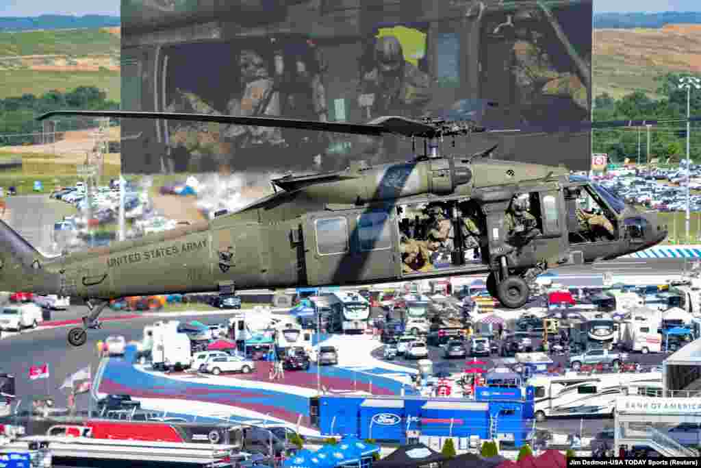 U.S. Army Fort Bragg Blackhawk helicopter flies in for the Memorial Day ceremony during the Coca-Cola 600 at Charlotte Motor Speedway in Concord, North Carolina, May 29, 2022.