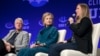 FILE - The Clintons — Bill, Hillary and daughter Chelsea — speak at a 2014 Clinton Global Initiative event at Arizona State University in Tempe. 