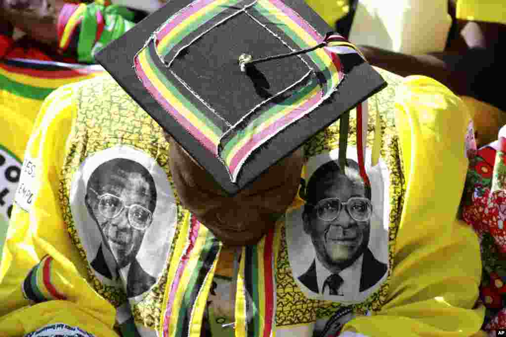 A supporter of Zimbabwean President Robert Mugabe attends his inauguration in Harare, August 22, 2013.