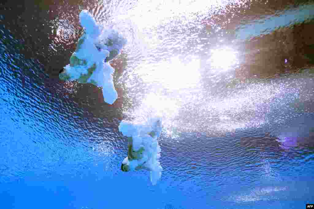China's Yuan Cao and Zongyuan Wang compete during the men's 3m synchronized diving finals as part of the Budapest 2022 World Aquatics Championships at the Duna Arena in Budapest, Hungary.