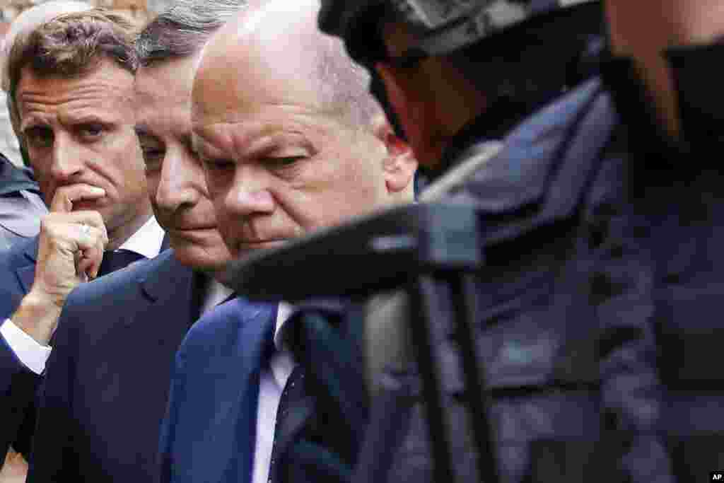 French President Emmanuel Macron, left, Italian Prime Minister Mario Draghi, center, and German Chancellor Olaf Scholz visit Irpin, outside Kyiv, Ukraine, in a show of collective European support for the Ukrainian people as they resist Russia's invasion.