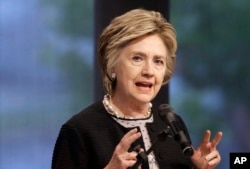 FILE - Former Democratic presidential candidate Hillary Clinton speaks in Baltimore, Maryland, June 5, 2017. While having multiple special counsels would not be unprecedented, the investigation of a sitting president’s former campaign rival would be.