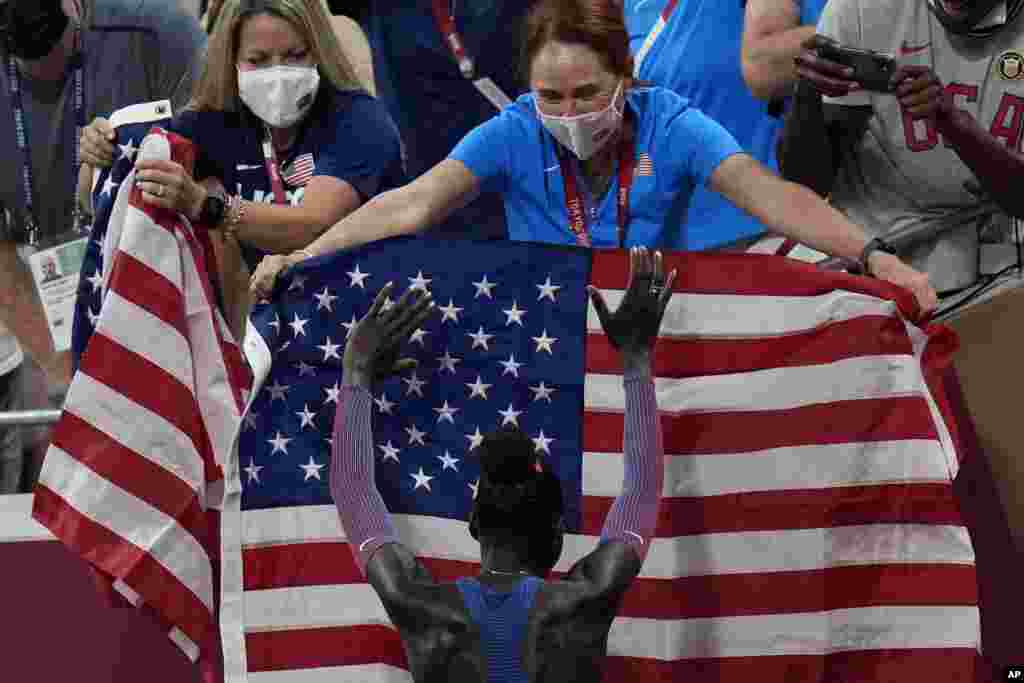 Athing Mu of United States celebrates after winning the final of the women's 800-meters at the 2020 Summer Olympics in Tokyo, Japan.
