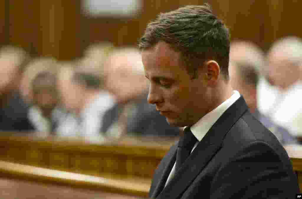 Oscar Pistorius sits in court, after judge Thokozile Masipa sentenced him to five years in prison, in Pretoria, South Africa, Oct. 21, 2014.