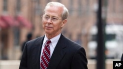 FILE - Dana Boente, then-First Assistant U.S. Attorney for the Eastern District of Virginia leaves federal court in Alexandria, Va. He became acting attorney general when President Donald Trump fired Sally Yates.