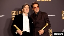FILE - Cillian Murphy and Robert Downey, Jr. were nominated for Oscars on Tuesday for their roles in 'Oppenheimer.' They are shown at the recent Golden Globes. (REUTERS/Mario Anzuoni)