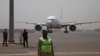 FILE - A plane is seen parked at the airport in Bamako, Mali, March 5, 2021.