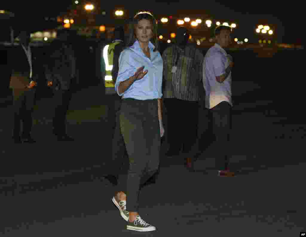 First lady Melania Trump boards a plane at Kotoka International Airport in Accra, Ghana, Oct. 4, 2018.