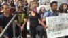 Protesters demonstrate against Attorney General Jeff Sessions where he spoke about "Free Speech Under Attack" at the Georgetown University Law Center in Washington, D.C., Sept. 26, 2017. (M. Farivar / VOA) 