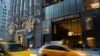 FILE - Traffic passes Trump Tower in New York, Nov. 21, 2016. 