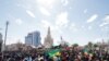 Supporters participate in a demonstration called by Mali transitional government after the Economic Community of West African States (ECOWAS) imposed sanctions in Bamako, Mali, Jan. 14, 2022.