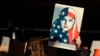 FILE - A protester holds a sign at San Francisco International Airport during a demonstration to denounce President Donald Trump's executive order that bars citizens of seven predominantly Muslim-majority countries from entering the U.S., Jan. 28, 2017.