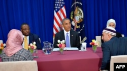 FILE - President Barack Obama participates in a roundtable discussion with members of the Muslim community while visiting the Islamic Society of Baltimore, Feb. 3, 2016, in Windsor Mill, Maryland. 