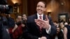 FILE - Deputy Attorney General-designate, federal prosecutor Rod Rosenstein, arrives on Capitol Hill in Washington, March 7, 2017, to testify at his confirmation hearing before the Senate Judiciary Committee. 