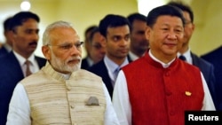 印度总理莫迪(左)和中国国家主席习近平(资料照片)