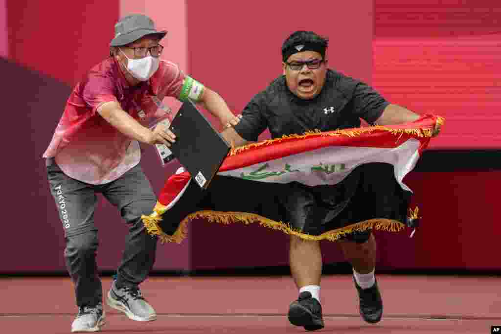 Iraq's Garrah Tnaiash reacts after a throw in the men's F40 shot put final during the 2020 Paralympics at the National Stadium in Tokyo, Japan.