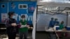Trabajadores de salud realizan tests para detectar COVID-19 en el parque Salesiano en Ciudad de México el 15 de julio de 2020.
