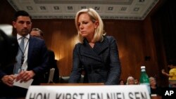 Homeland Security Secretary Kirstjen Nielsen arrives to testify to the Senate Homeland Security Committee, May 15, 2018, on Capitol Hill in Washington. Nielsen told the committee that DHS needed "clear legal authority to identify, track and mitigate drones that could pose a danger to the public and to DHS operations."