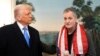 President Donald Trump, accompanied by Marc Fogel, speaks in the Diplomatic Reception Room at the White House, Feb. 11, 2025, in Washington.