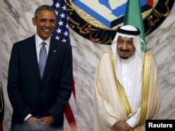 FILE - President Barack Obama stands next to Saudi Arabia's King Salman during the summit of the Gulf Cooperation Council in Riyadh, Saudi Arabia, April 21, 2016.