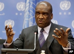FILE - John Ashe, Antigua and Barbuda's former U.N. ambassador, speaks during a news conference at U.N. headquarters, Sept. 17, 2013.