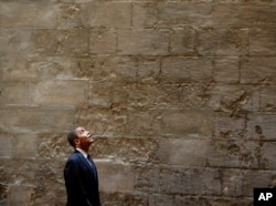 FILE - President Barack Obama tours the Sultan Hassan Mosque in Cairo, Egypt, June 4, 2009.