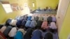 FILE – In this Sept. 23, 2016, photo, Muslim worshippers pray during a service at the Bernards Township Community Center in Basking Ridge, New Jersey.