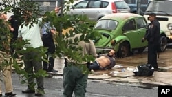 Ahmad Khan Rahami is taken into custody after a shootout with police Monday, Sept. 19, 2016.