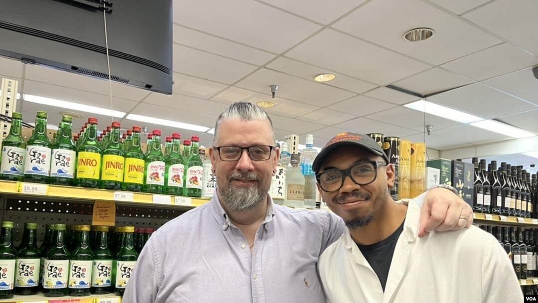 Richard Harris, General Manager of Calvert Woodley, a liquor store in Washington, DC, with Xavier Scott, cheese specialist. Photo by Natalie Liu