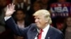 President-elect Donald Trump waves and smiles as he speaks during the first stop of his post-election tour, Dec. 1, 2016, in Cincinnati, Ohio. 