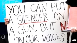 FILE - People participate in a "March for Our Lives" rally in Jackson, Miss., March 24, 2018. Activists across the U.S. planned events in conjunction with a Washington march spearheaded by teens from Marjory Stoneman Douglas High School in Parkland, Fla., where 17 people were killed in February. Some Stoneman Douglas students participated in a rally at National Rifle Association headquarters in Fairfax, Va., Aug. 4, 2018.