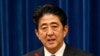 安倍希望经济活动促进日中关系