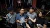 Detained Reuters journalist Wa Lone speaks to the media as he leaves Insein court in Yangon, Myanmar August 6, 2018. REUTERS/Ann Wang - RC1FE4368500