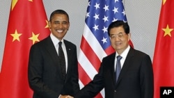 美中两国关系微妙。图为奥巴马总统与中国最高领导人胡锦涛3月26日在韩国首尔举行的核不扩散峰会上会面资料照。