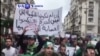 VOA60 DUNIYA: Masu Zanga-zangar Na Neman Shugaba Abdelaziz Bouteflika Ya Yi Murabus
