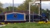 FILE - The gate for the Joint Base Anacostia-Bolling is seen in Washington, D.C., April 17, 2013. The base was one of the Washington-area sites that received suspicious packages Monday.