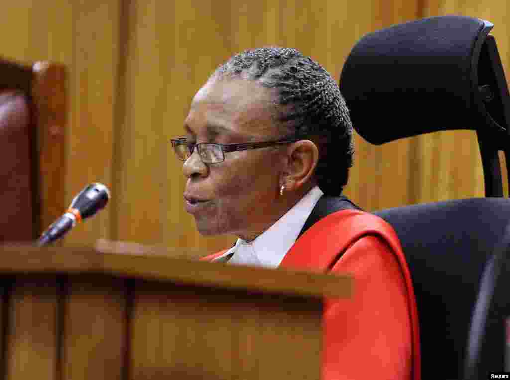 Judge Thokozile Masipa reads her verdict in the Oscar Pistorius trial at the North Gauteng High Court in Pretoria, Sept. 11, 2014. 