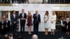 FILE - Then-candidate Donald Trump, accompanied by his family, speaks during the grand opening of the Trump International Hotel-Old Post Office, Washington, Oct. 26, 2016. Experts on government ethics warned Trump that he’d never shake suspicions of a clash between his private interests and the public good if he didn't sell off his vast holdings.