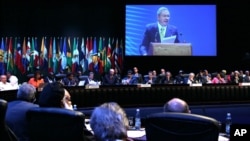 A large screen shows Cuba's President Raul Castro speaking at the opening ceremony of the CELAC Summit in Havana, Jan. 28, 2014. 