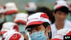 图为广东佛山日本本田汽车公司的中国工人2010年5月26日举行罢工时的情形